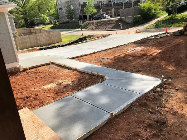 Concrete driveway project by Apex Landscaping