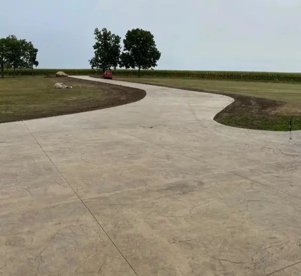 Concrete driveway project by Apex Landscaping