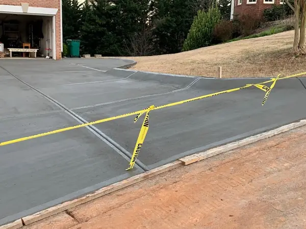 Concrete driveway project by Apex Landscaping