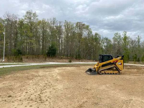 Land clearing project by Apex Landscaping